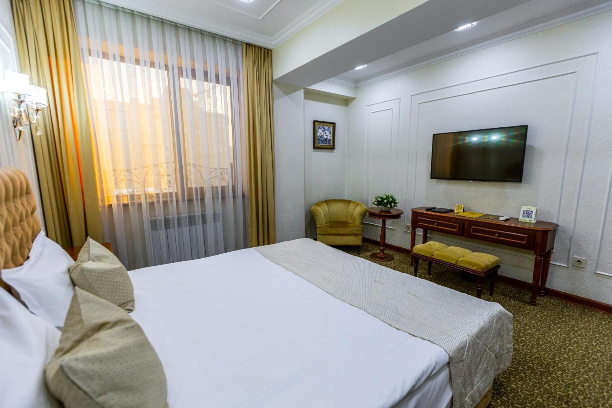 Plaza Hotel Almatý Habitación foto